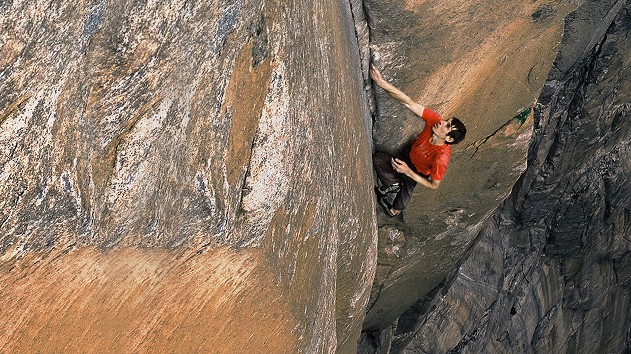 Man climbs mountain without a rope